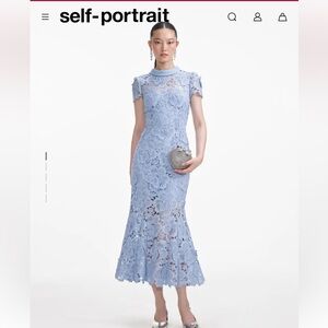 Blue lace dress with crystals. size S like new